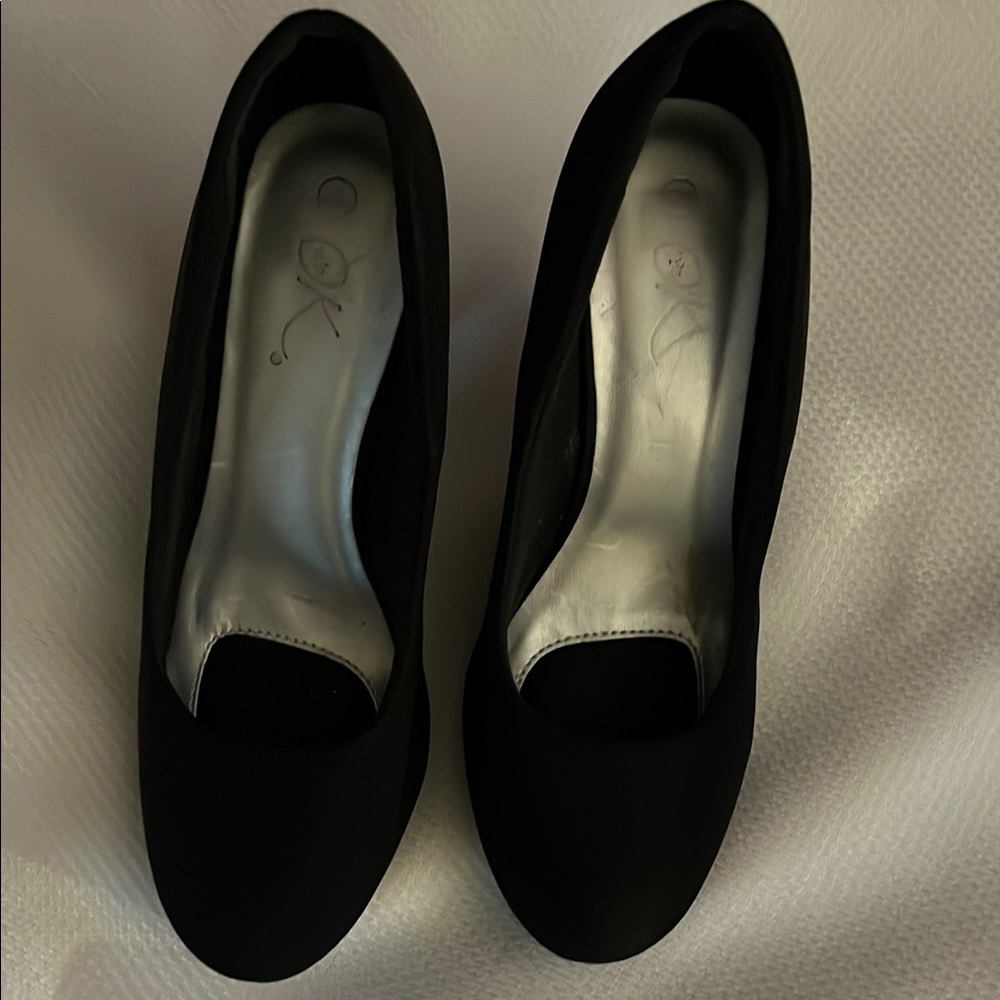 Elegant Black Leather Heels with Polished Finish